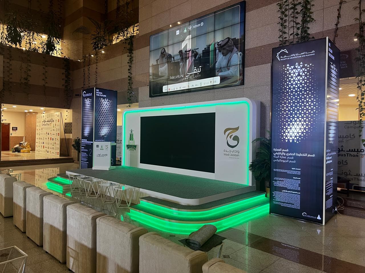 Workshop production team assembling a booth in Saudi